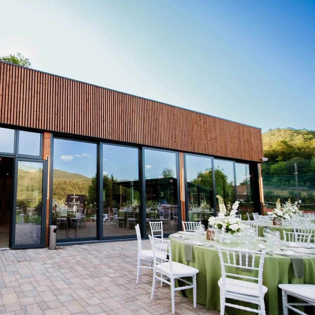A-Shape hospitality pavilion with timber façade