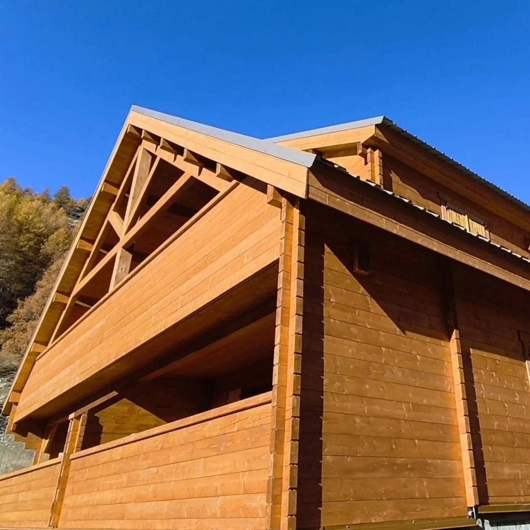 Completed solid timber Alpine Log House manufactured by ERGIO