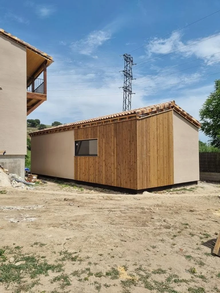 Side elevation of the music studio with timber cladding
