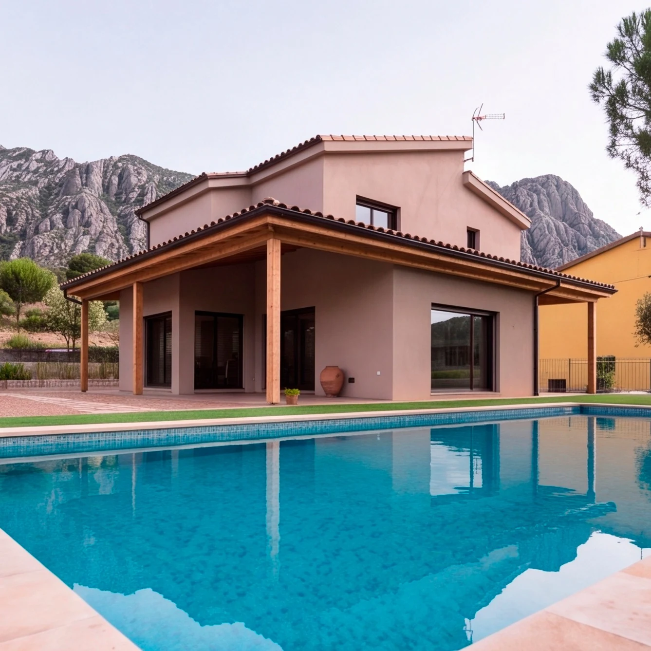 Collbato residence and pool with mountain backdrop