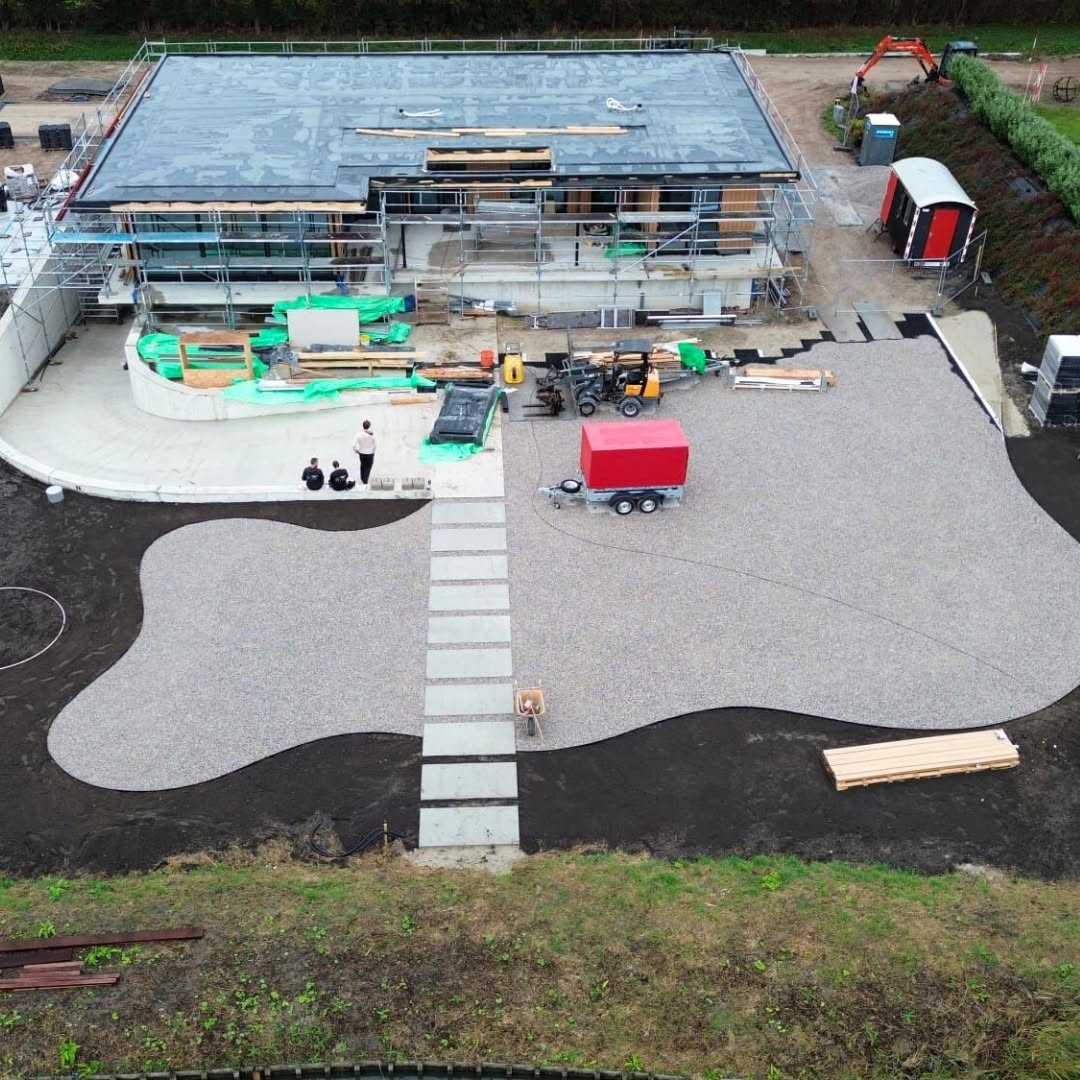 Aerial progress view of the De Lier residence and its gravel courtyard