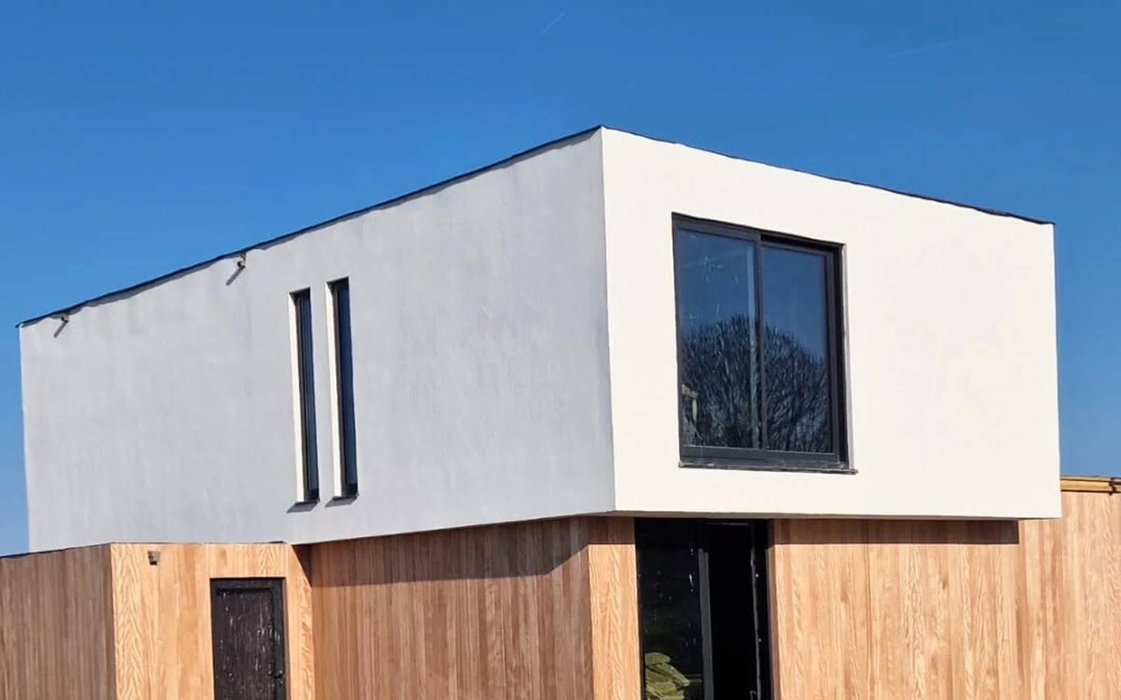 Dutch Multi-Typology Timber Residence in the Netherlands