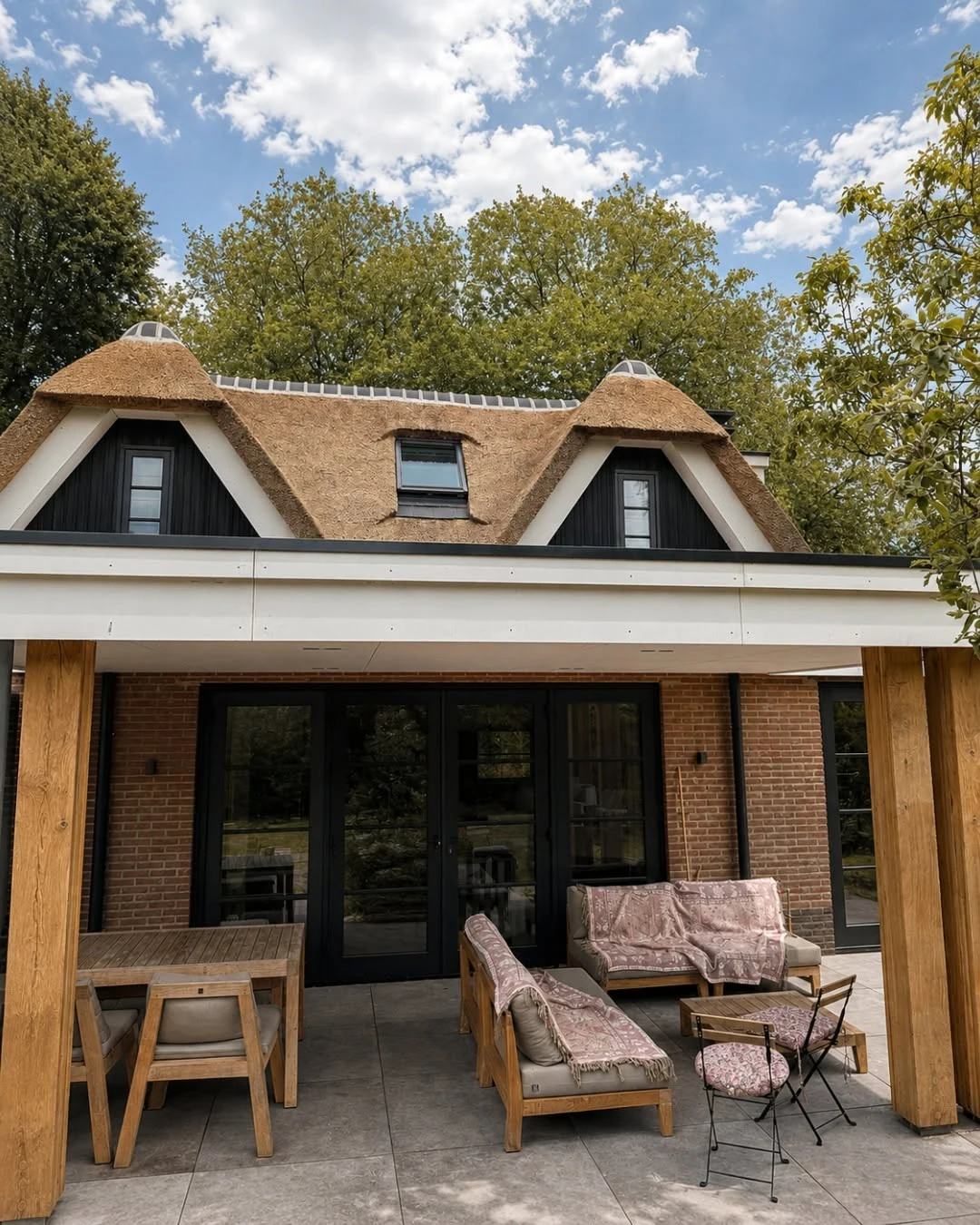 Covered rear terrace and thatched roof
