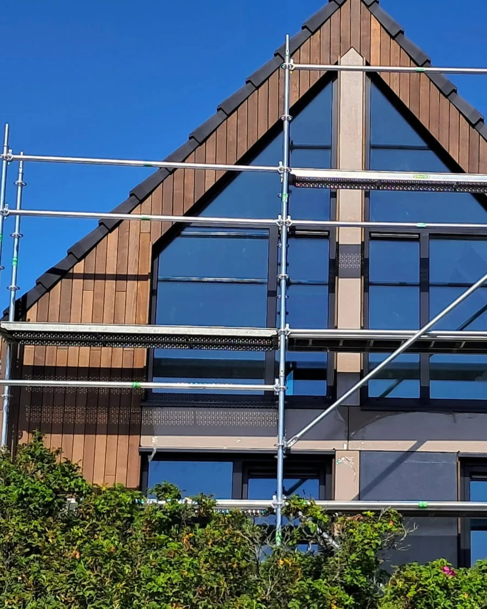 Timber cladding and façade interface detail on the Dutch hybrid residence
