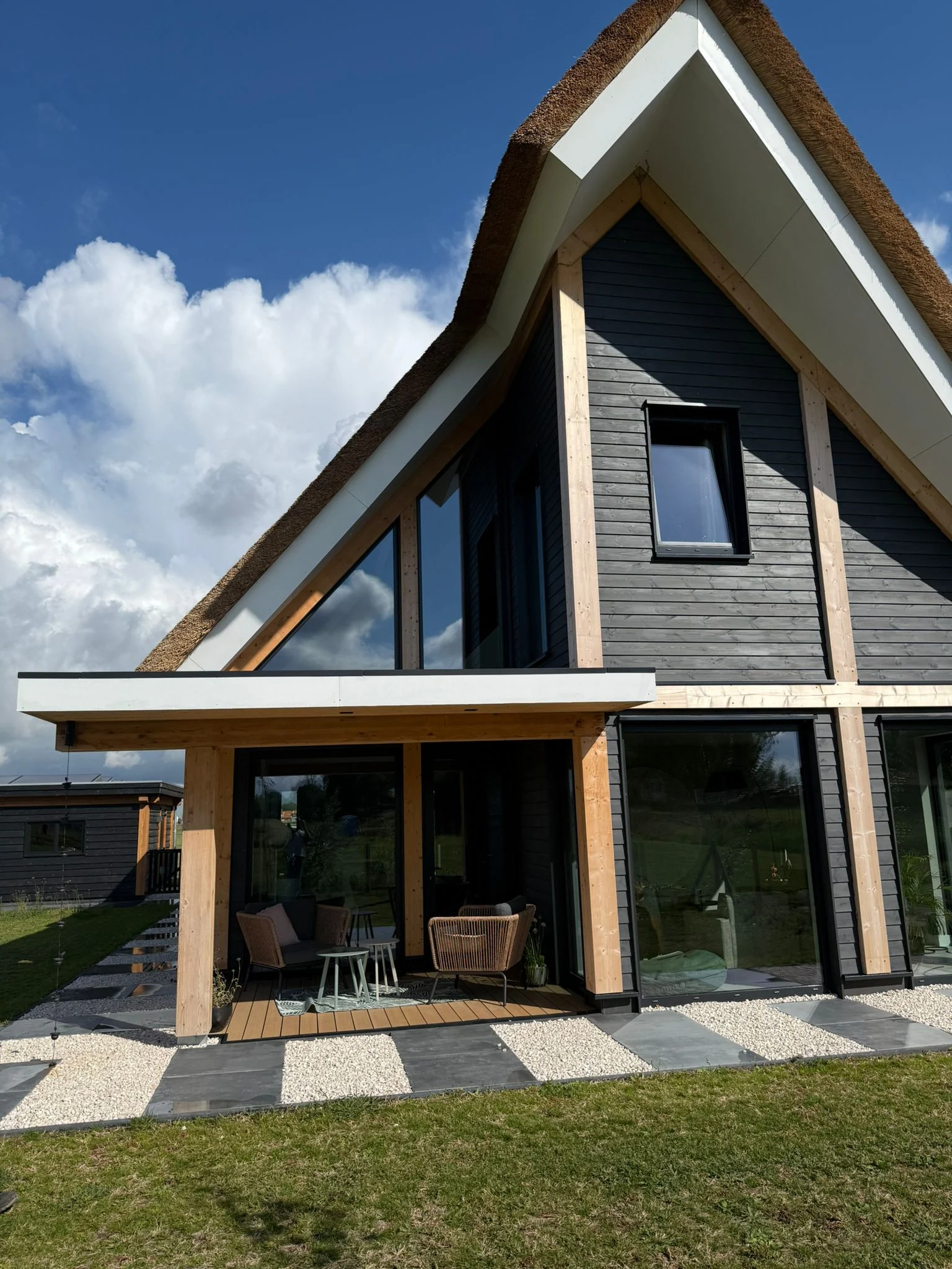 Ed timber residence gable façade detail with terrace