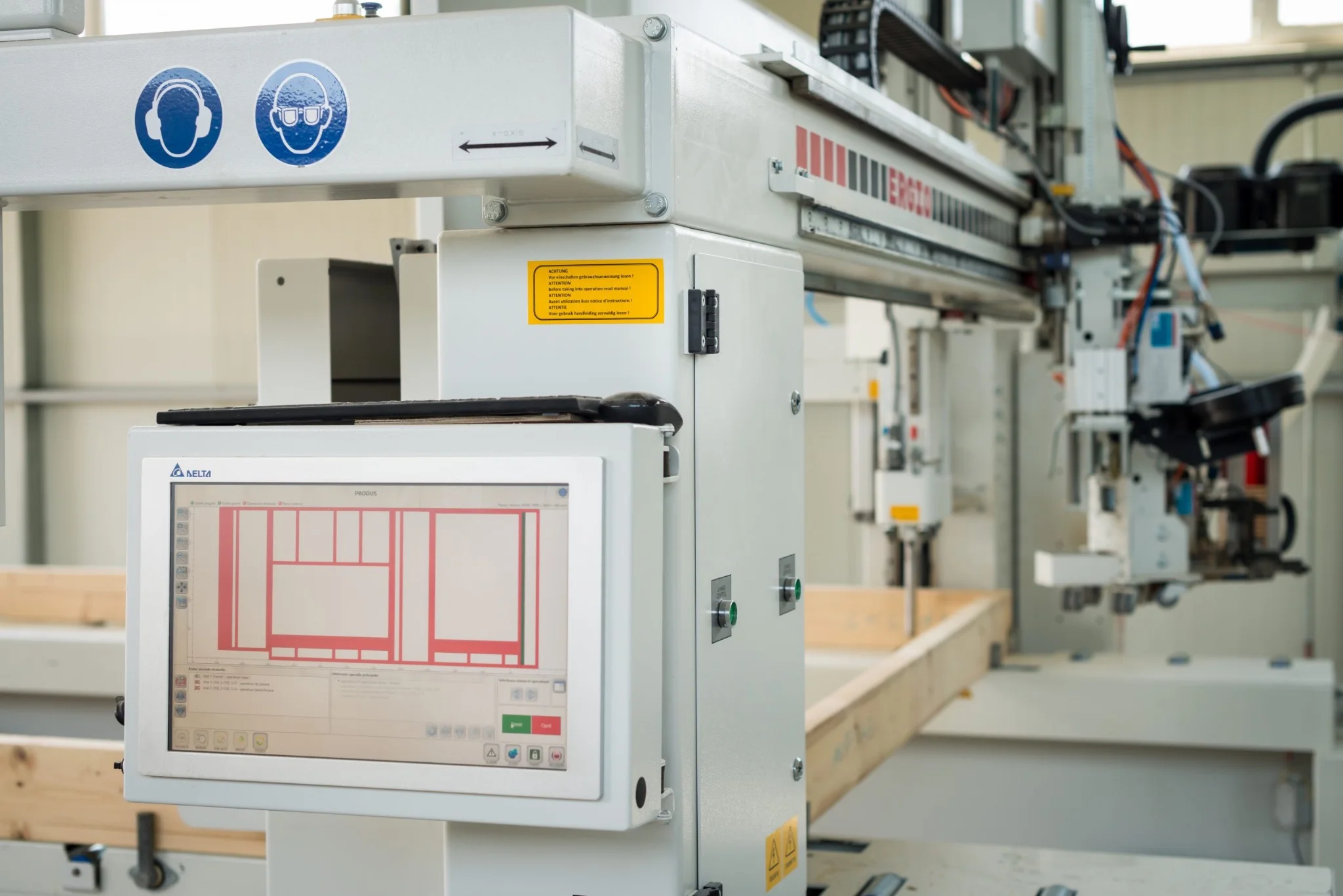 ERGIO automated timber-frame production equipment with digital panel layout