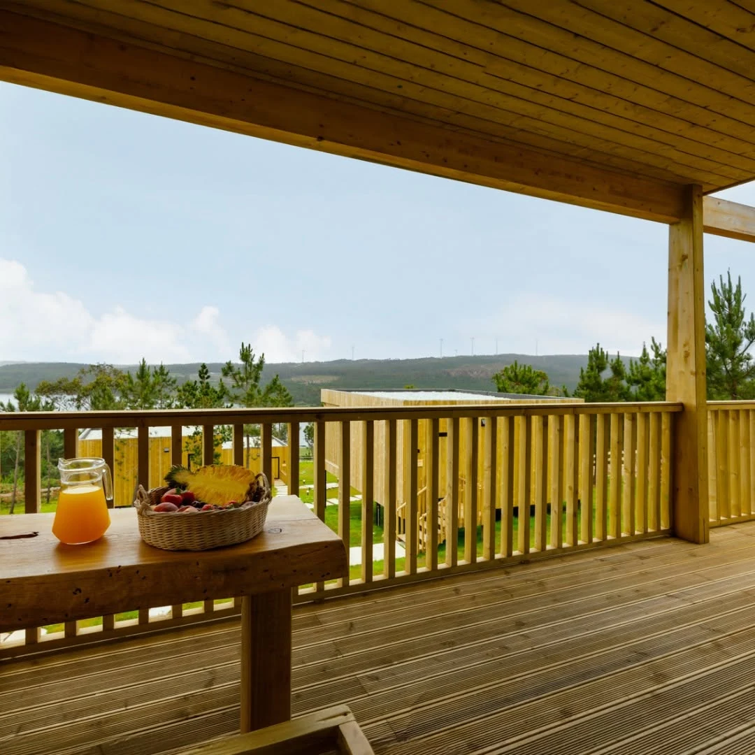 Timber terrace and view from one of the glamping cabins