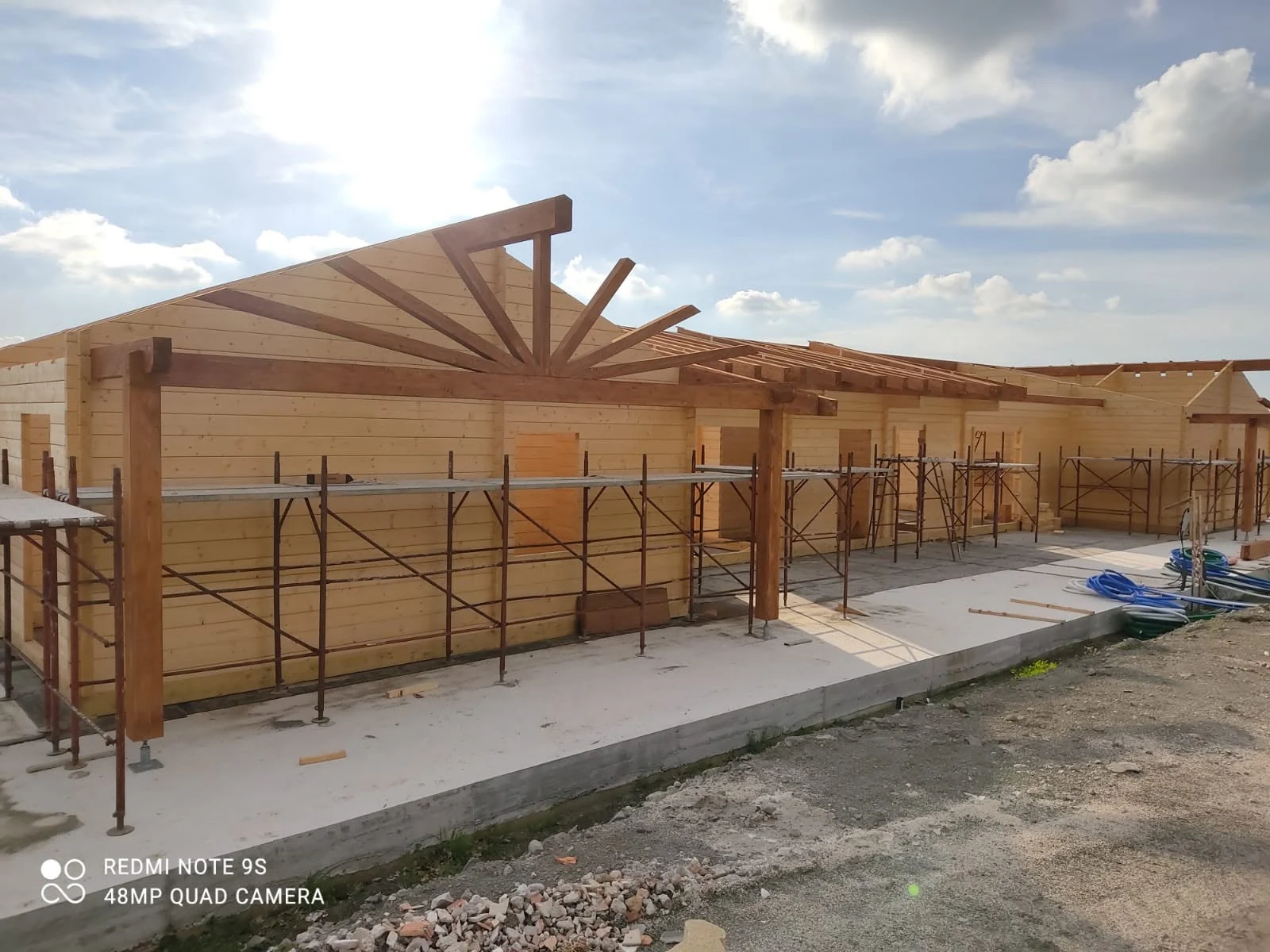 Side elevation with entrance canopy details during assembly