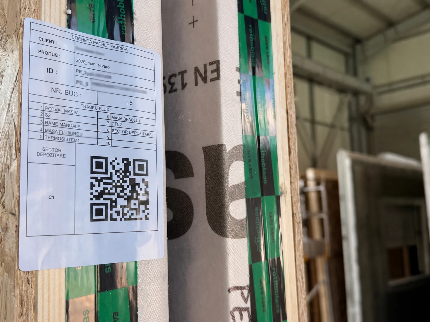 Component identity label fixed to a packaged timber wall element