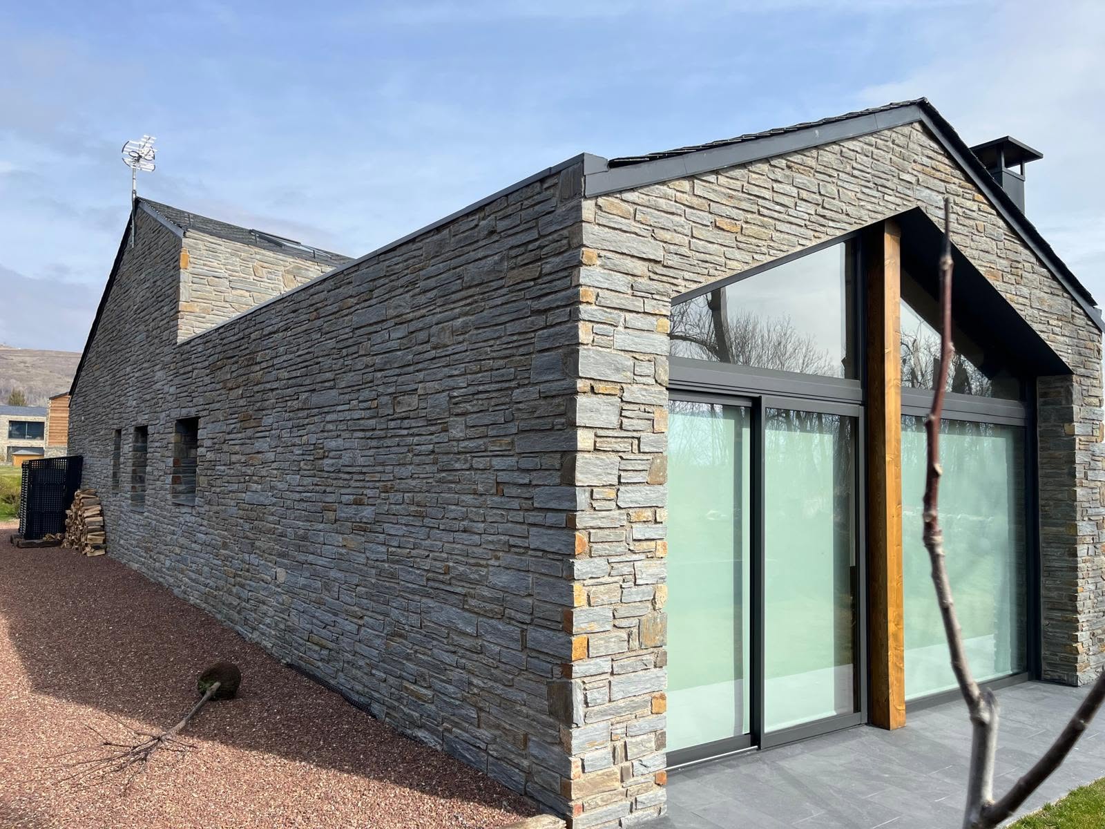 Stone-and-timber residence from the Sunlit Series