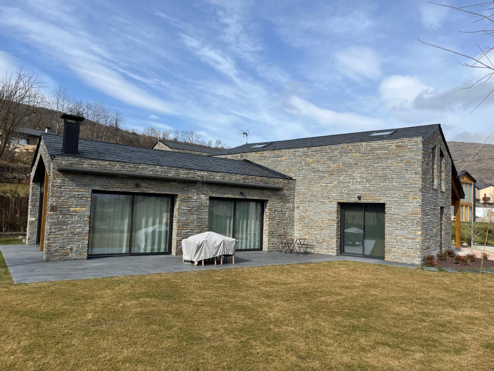 Garden elevation of the gabled residence