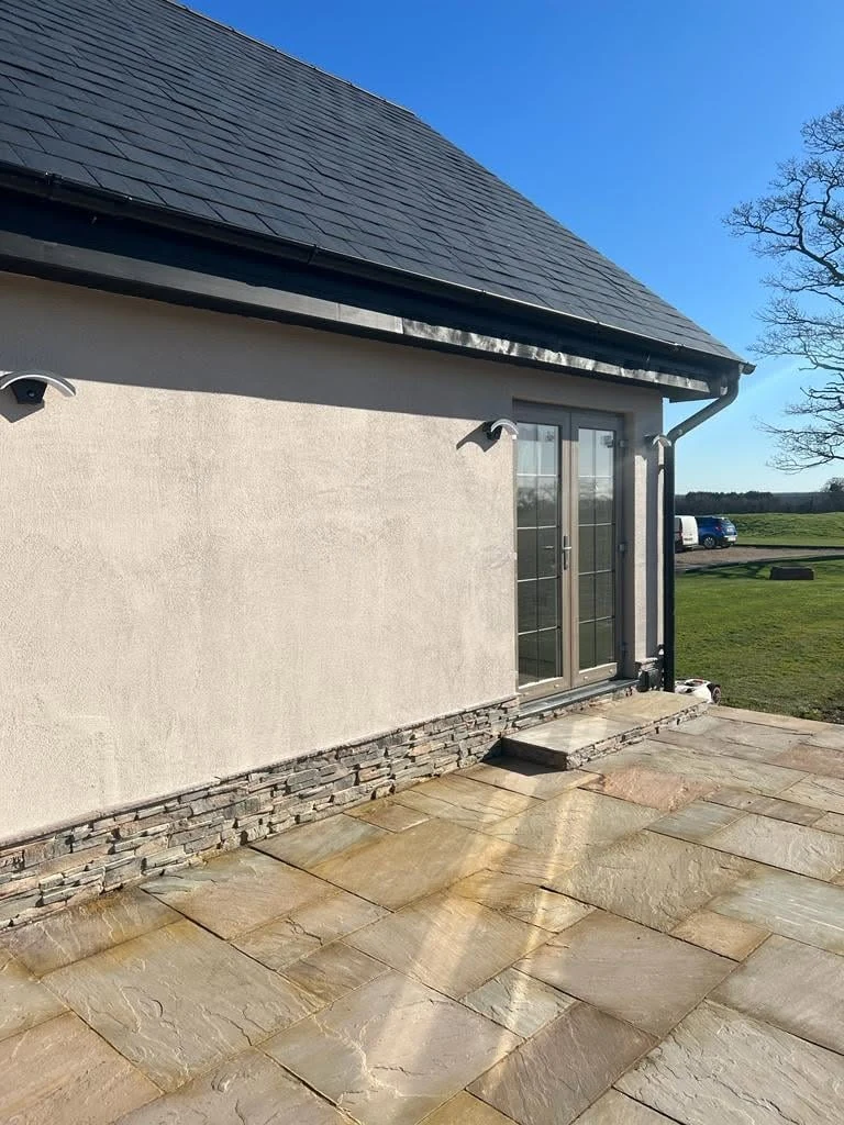 Terrace corner and entrance detail of the house